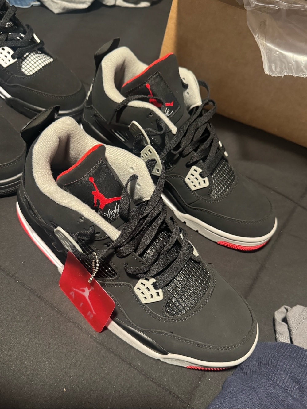 Nike Black/Red Air Jordan 4 Low Top Sneakers